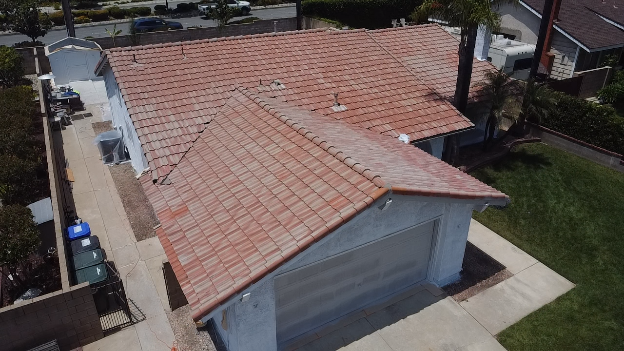 Roof before painting — faded terracotta tile